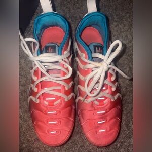 Pink and blue Nike vapormax